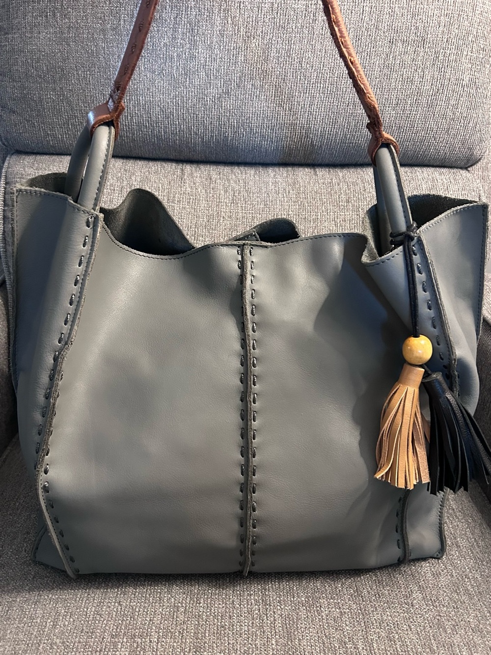 The Sak Los Feliz Large Tote Bag in Dusty Blue with Tassel Accent